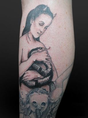 Girl With Snake Tattoo On Leg